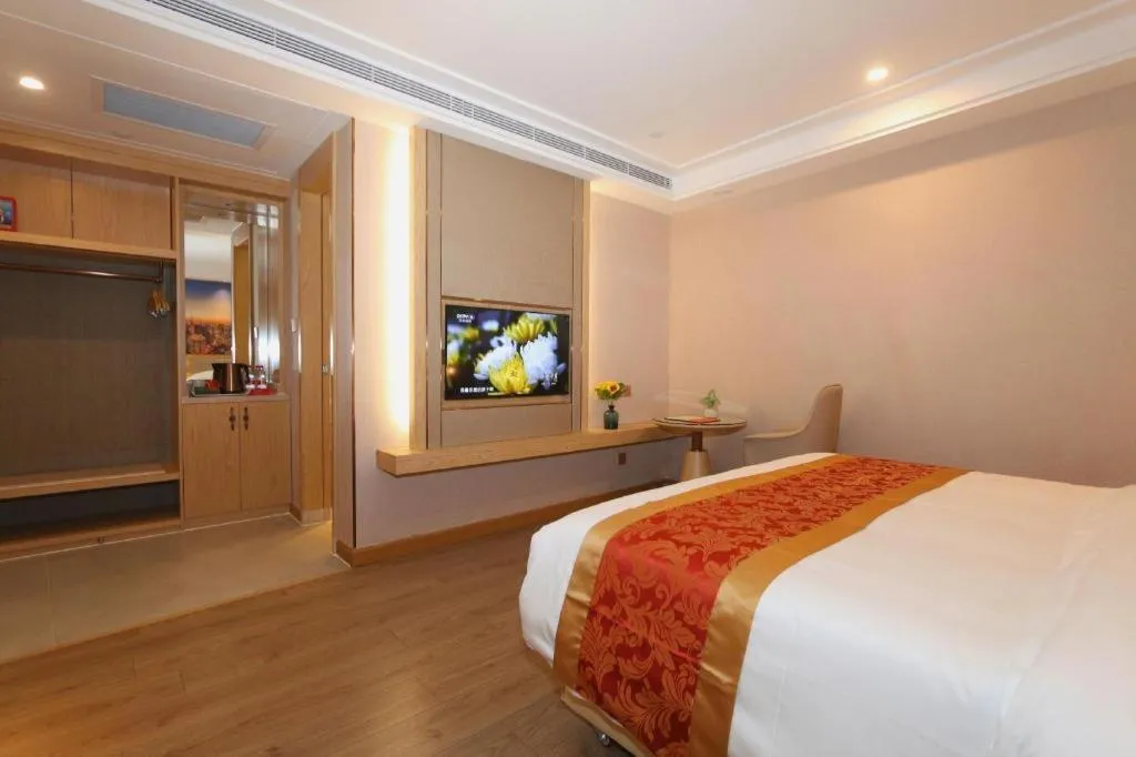 Bed in SHANGJINGHAO HOTEL （SAKATA SNOW ELEPHANT SUBWAY STATION SHOP）