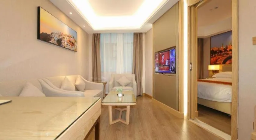 Bed in SHANGJINGHAO HOTEL （SAKATA SNOW ELEPHANT SUBWAY STATION SHOP）