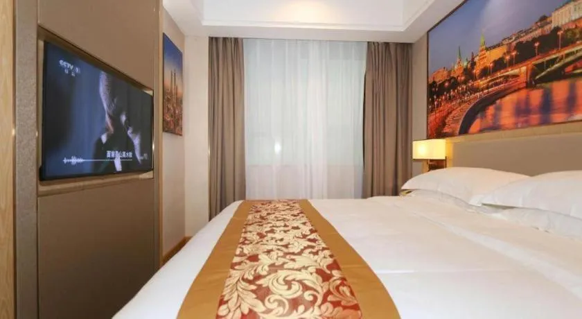 Bed in SHANGJINGHAO HOTEL （SAKATA SNOW ELEPHANT SUBWAY STATION SHOP）