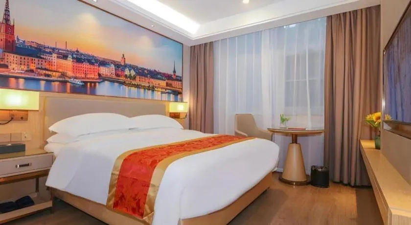 Bed in SHANGJINGHAO HOTEL （SAKATA SNOW ELEPHANT SUBWAY STATION SHOP）