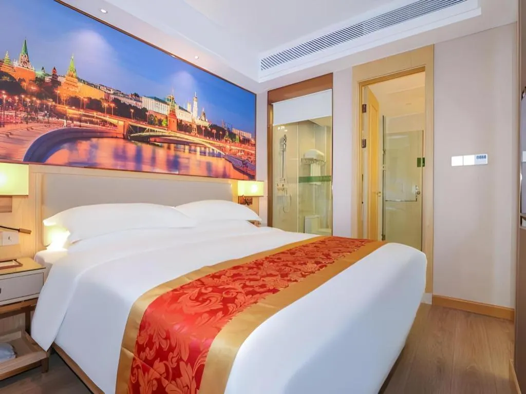 Bed in SHANGJINGHAO HOTEL （SAKATA SNOW ELEPHANT SUBWAY STATION SHOP）