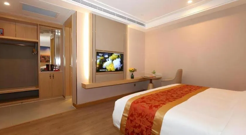 Bed in SHANGJINGHAO HOTEL （SAKATA SNOW ELEPHANT SUBWAY STATION SHOP）