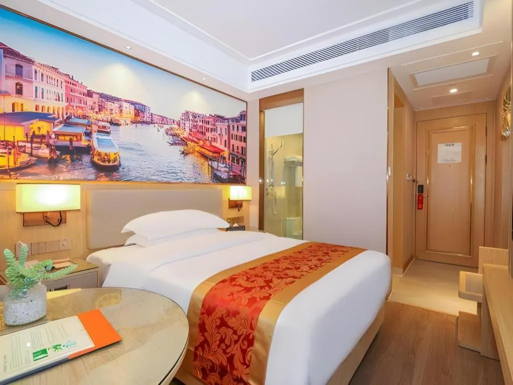 Bed in SHANGJINGHAO HOTEL （SAKATA SNOW ELEPHANT SUBWAY STATION SHOP）