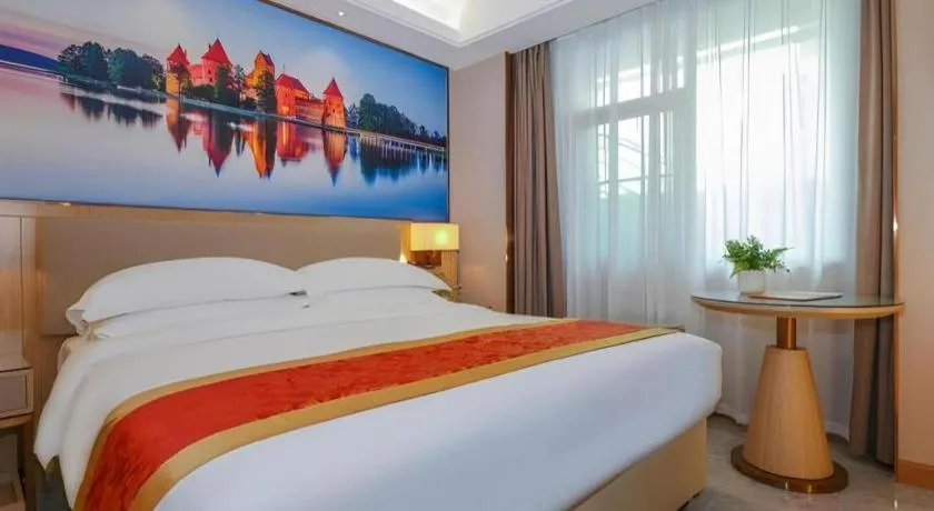 Bed in SHANGJINGHAO HOTEL （SAKATA SNOW ELEPHANT SUBWAY STATION SHOP）