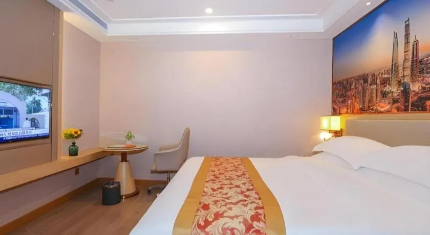 Bed in SHANGJINGHAO HOTEL （SAKATA SNOW ELEPHANT SUBWAY STATION SHOP）
