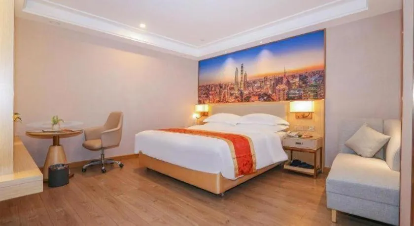 Bed in SHANGJINGHAO HOTEL （SAKATA SNOW ELEPHANT SUBWAY STATION SHOP）