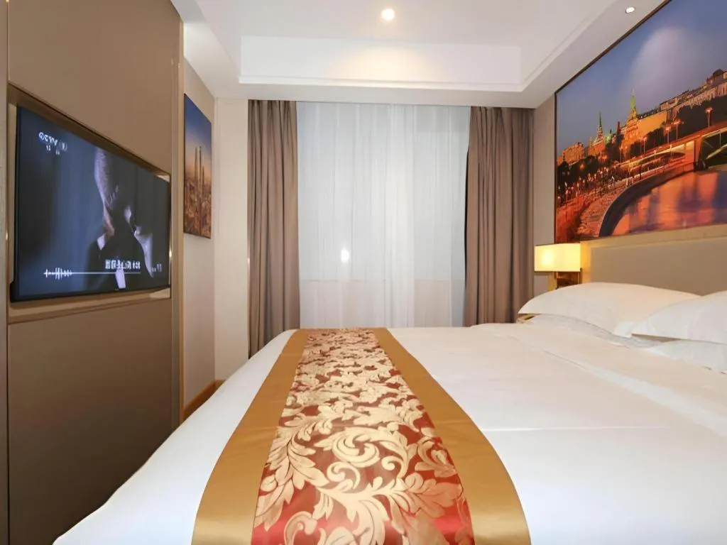 Bed in SHANGJINGHAO HOTEL （SAKATA SNOW ELEPHANT SUBWAY STATION SHOP）