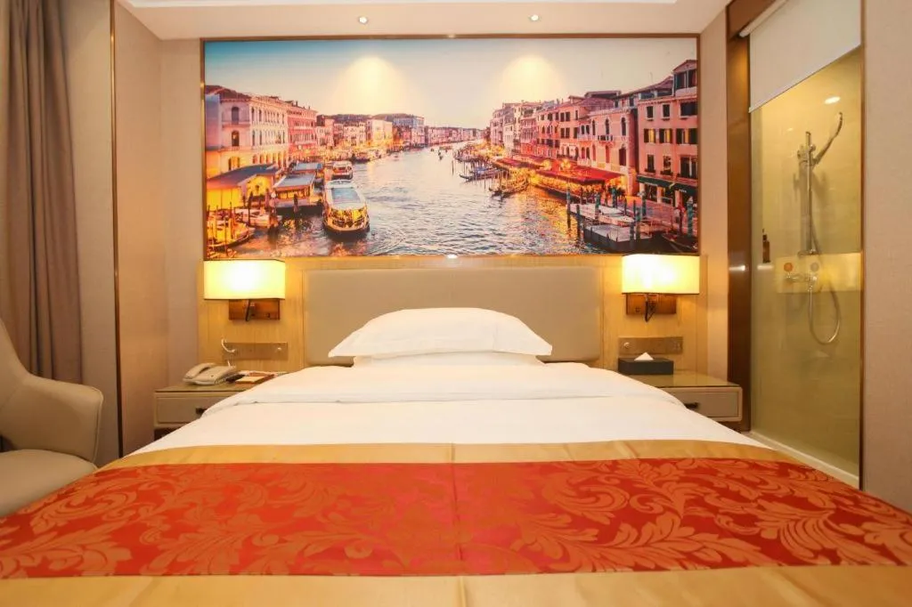 Bed in SHANGJINGHAO HOTEL （SAKATA SNOW ELEPHANT SUBWAY STATION SHOP）