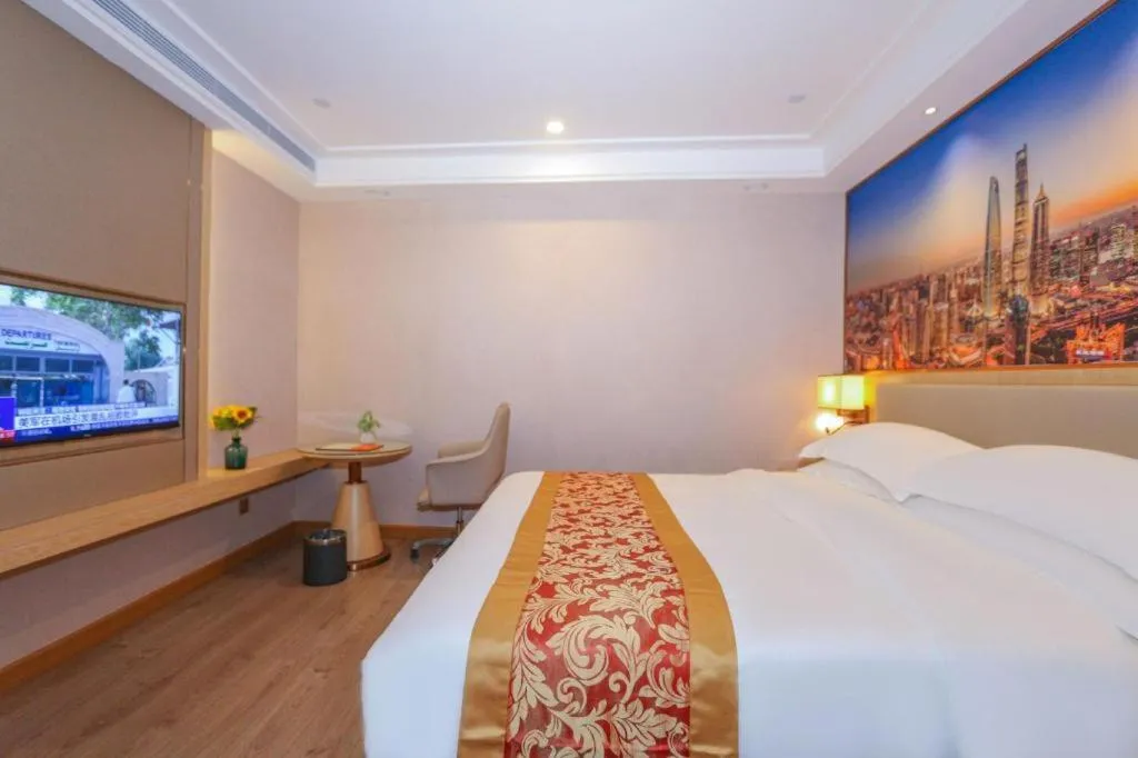 Bed in SHANGJINGHAO HOTEL （SAKATA SNOW ELEPHANT SUBWAY STATION SHOP）