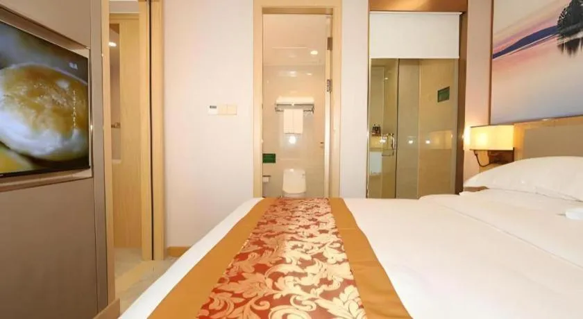 Bed in SHANGJINGHAO HOTEL （SAKATA SNOW ELEPHANT SUBWAY STATION SHOP）