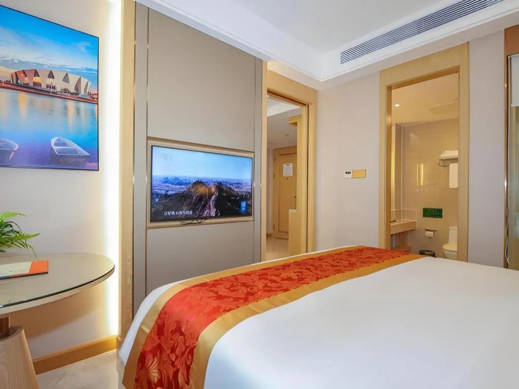 Bed in SHANGJINGHAO HOTEL （SAKATA SNOW ELEPHANT SUBWAY STATION SHOP）
