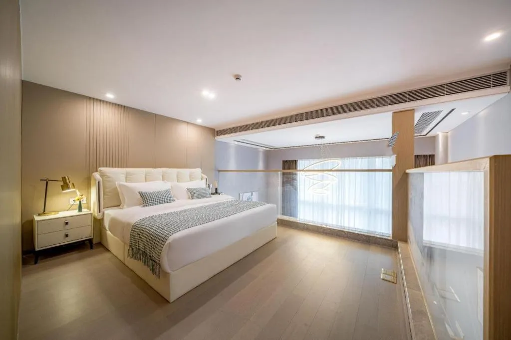 Bed in F-TOWN Fangtang Hotel (Shenzhen Longgang Tian'an Digital City Huanggekeng Subway Station)