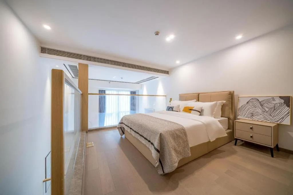 Bed in F-TOWN Fangtang Hotel (Shenzhen Longgang Tian'an Digital City Huanggekeng Subway Station)