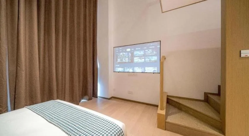 Bed in F-TOWN Fangtang Hotel (Shenzhen Longgang Tian'an Digital City Huanggekeng Subway Station)