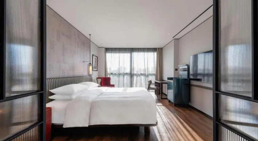 Bed in Mumian Rizhao Hotel