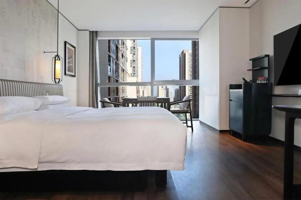 Bed in Mumian Rizhao Hotel