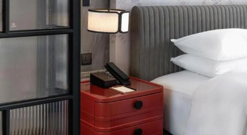 Bed in Mumian Rizhao Hotel