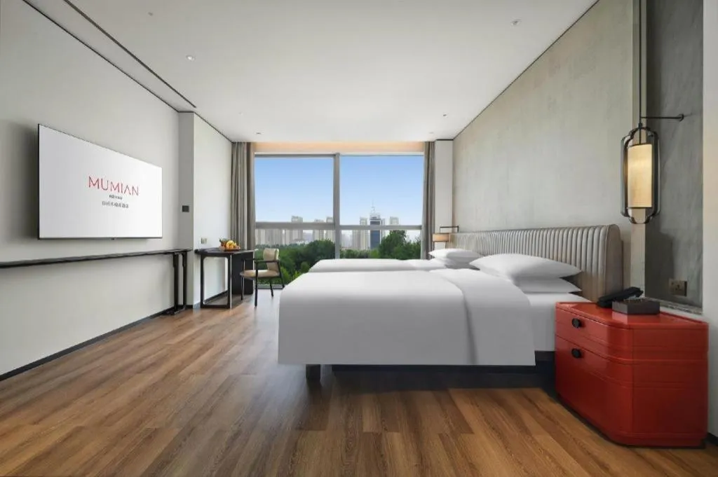 Bed in Mumian Rizhao Hotel