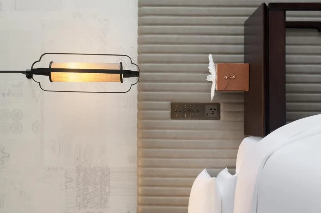 Bed in Mumian Rizhao Hotel