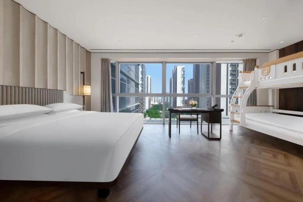 Bed in Mumian Rizhao Hotel