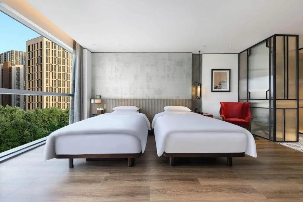 Bed in Mumian Rizhao Hotel