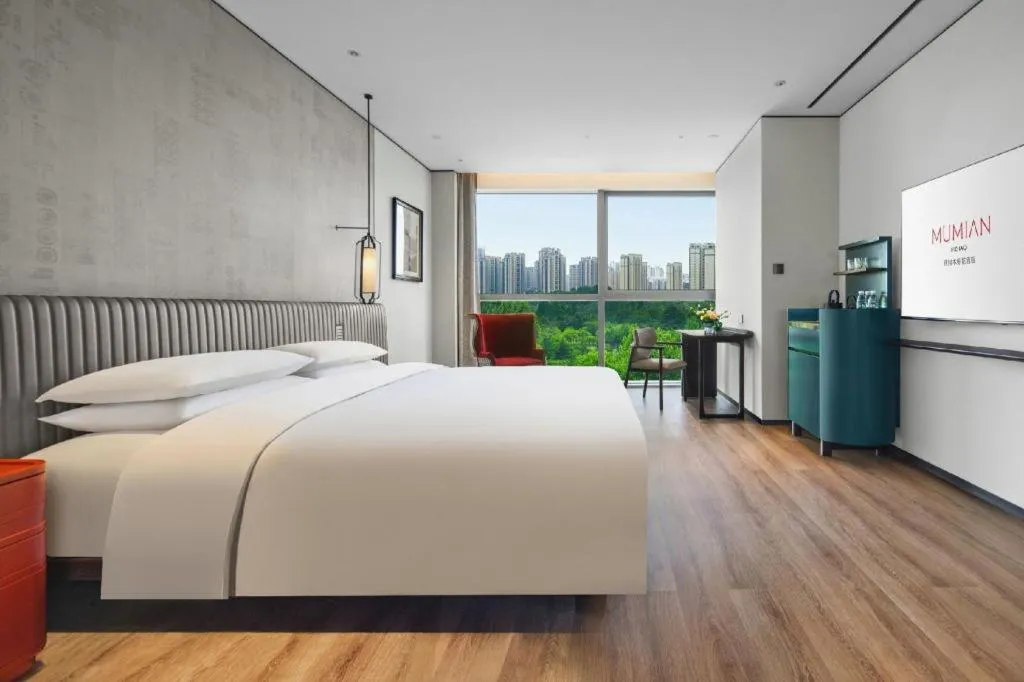 Bed in Mumian Rizhao Hotel