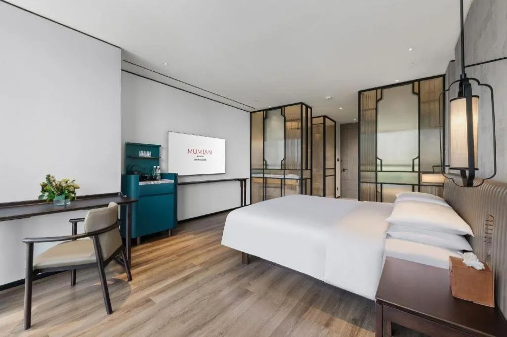 Bed in Mumian Rizhao Hotel