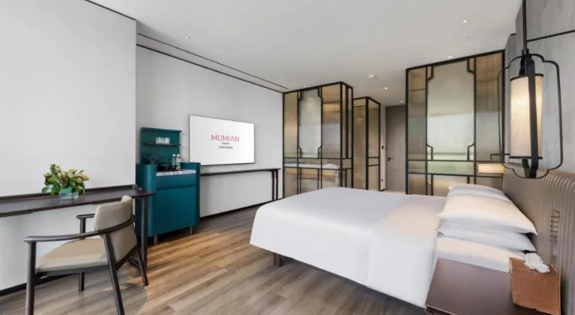 Bed in Mumian Rizhao Hotel