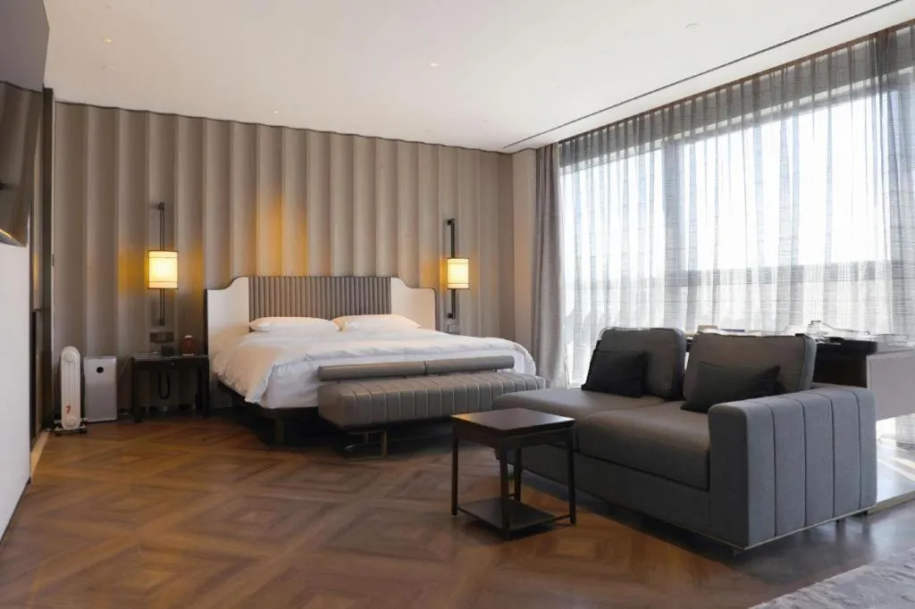 Bed in Mumian Rizhao Hotel