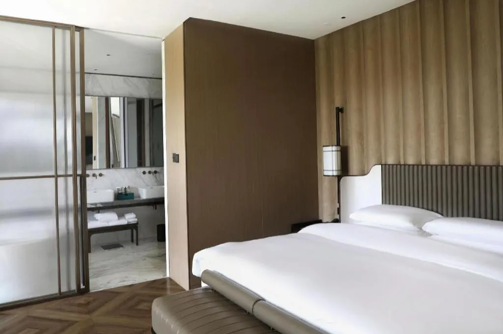 Bed in Mumian Rizhao Hotel