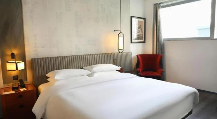 Bed in Mumian Rizhao Hotel