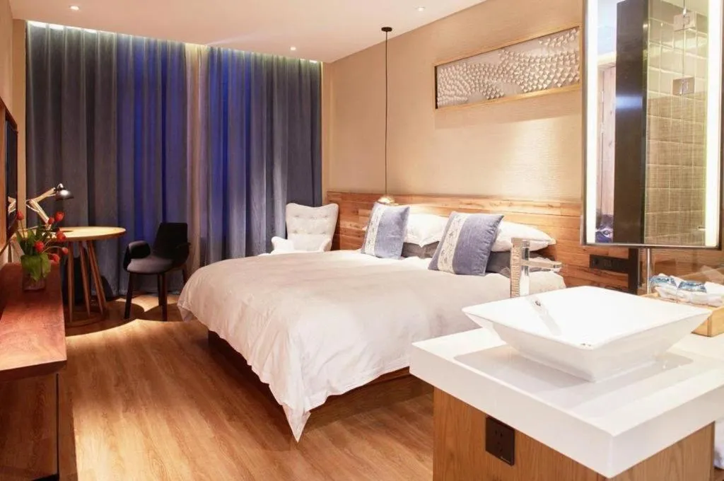 Bed in Yiqi Ecological Art Hotel Hangzhou Xixi Wetland Park Branch