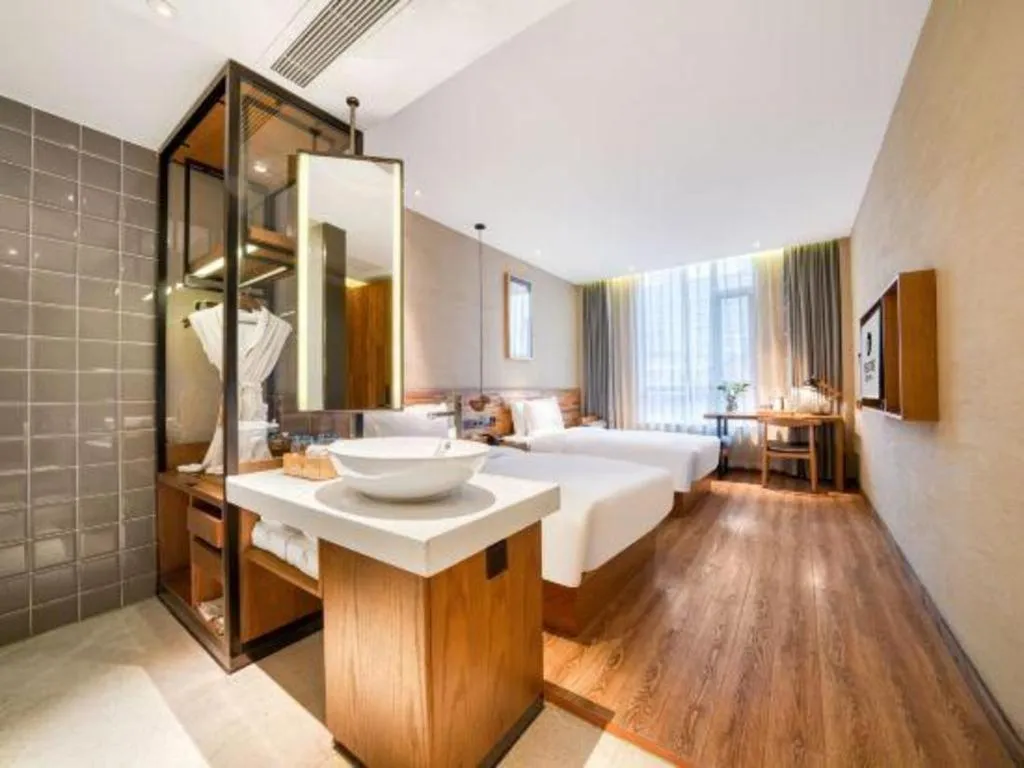 Bed in Yiqi Ecological Art Hotel Hangzhou Xixi Wetland Park Branch