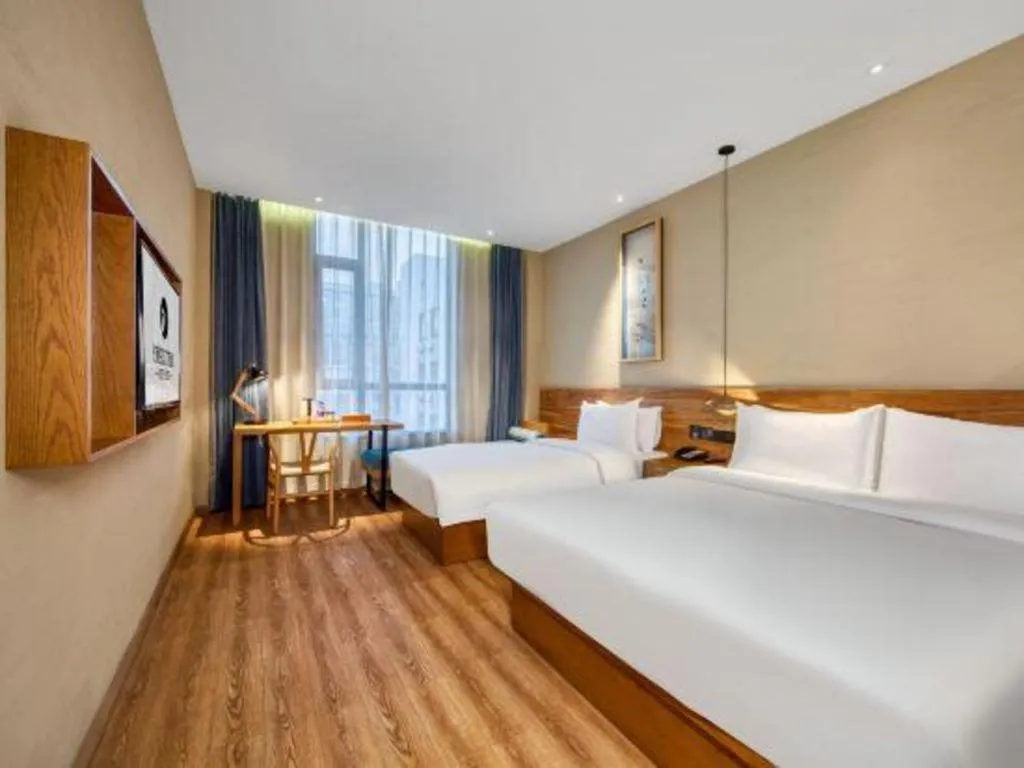 Bed in Yiqi Ecological Art Hotel Hangzhou Xixi Wetland Park Branch