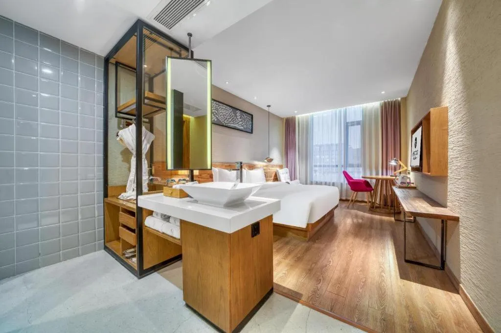 Bed in Yiqi Ecological Art Hotel Hangzhou Xixi Wetland Park Branch
