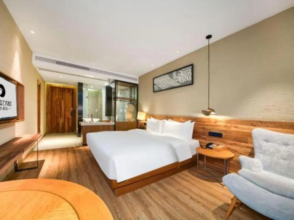 Bed in Yiqi Ecological Art Hotel Hangzhou Xixi Wetland Park Branch