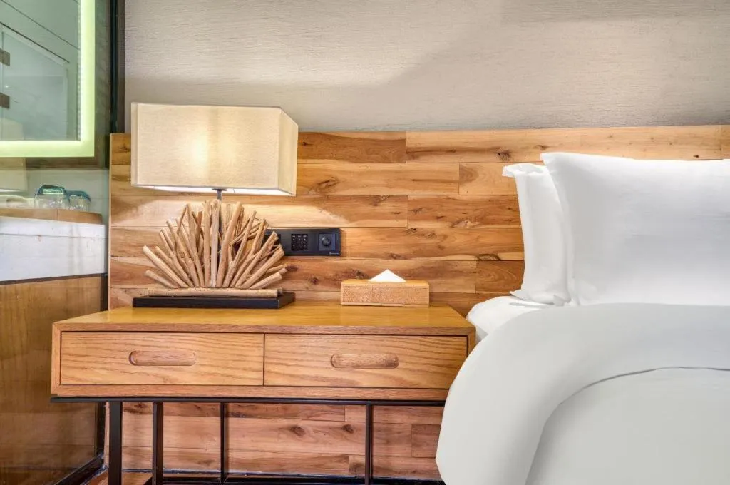 Bed in Yiqi Ecological Art Hotel Hangzhou Xixi Wetland Park Branch