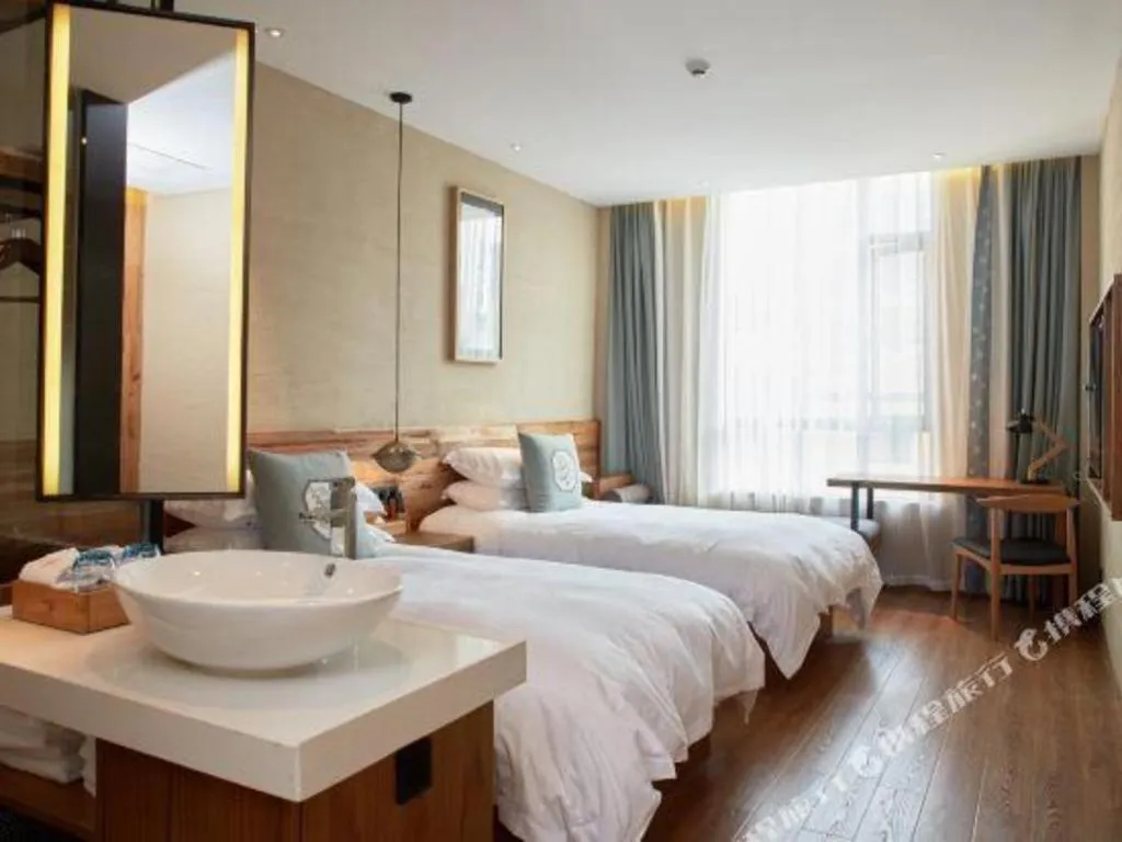 Bed in Yiqi Ecological Art Hotel Hangzhou Xixi Wetland Park Branch