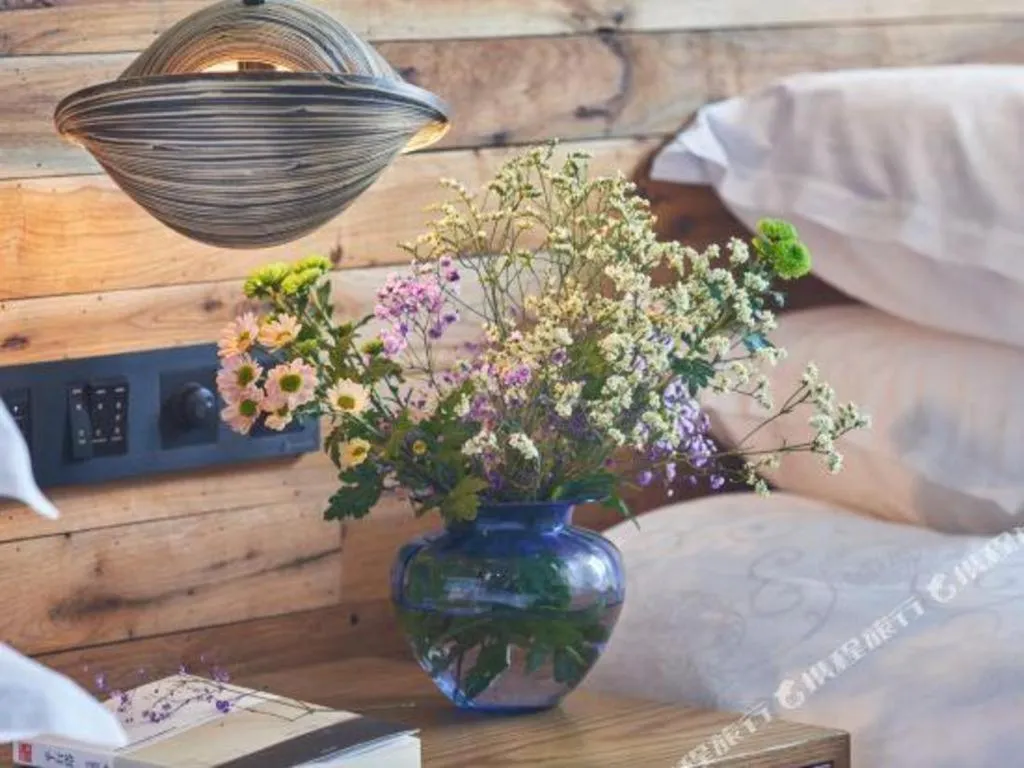 Bed in Yiqi Ecological Art Hotel Hangzhou Xixi Wetland Park Branch