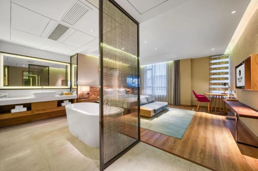 Bed in Yiqi Ecological Art Hotel Hangzhou Xixi Wetland Park Branch