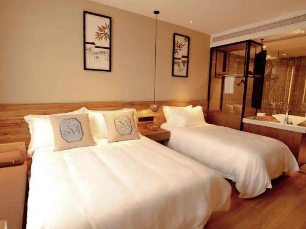Bed in Yiqi Ecological Art Hotel Hangzhou Xixi Wetland Park Branch