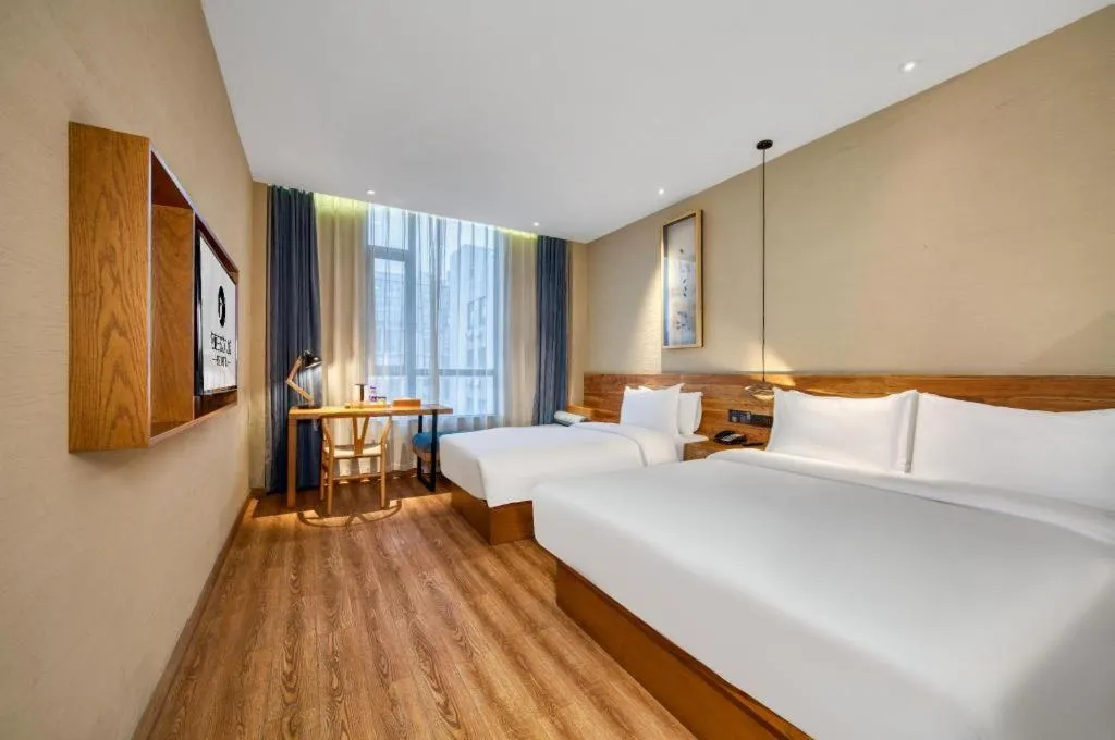 Bed in Yiqi Ecological Art Hotel Hangzhou Xixi Wetland Park Branch