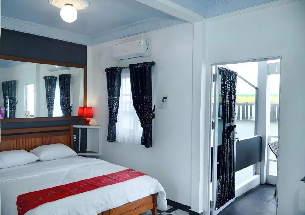 Bed in Sunset Curly Bay Hotel & Resort