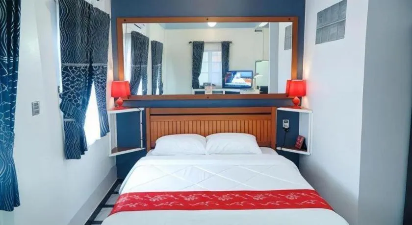 Bed in Sunset Curly Bay Hotel & Resort