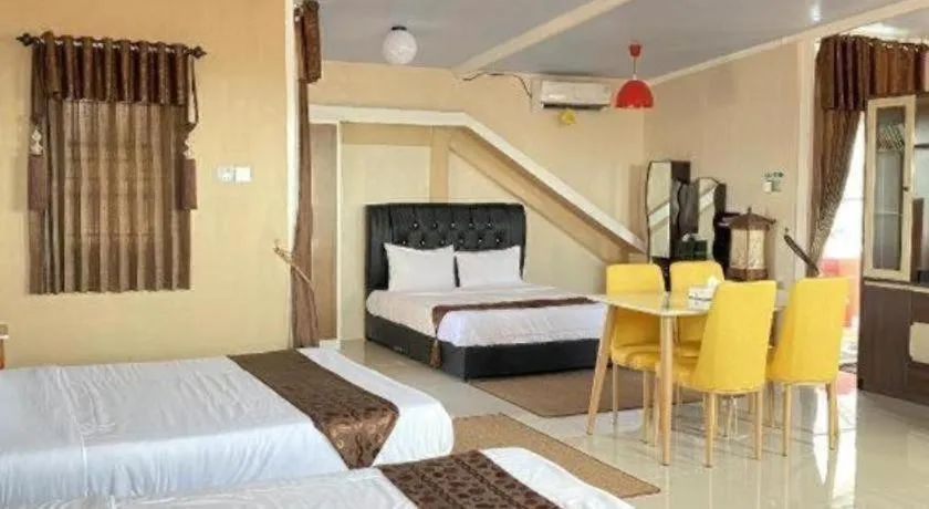 Bed in Sunset Curly Bay Hotel & Resort