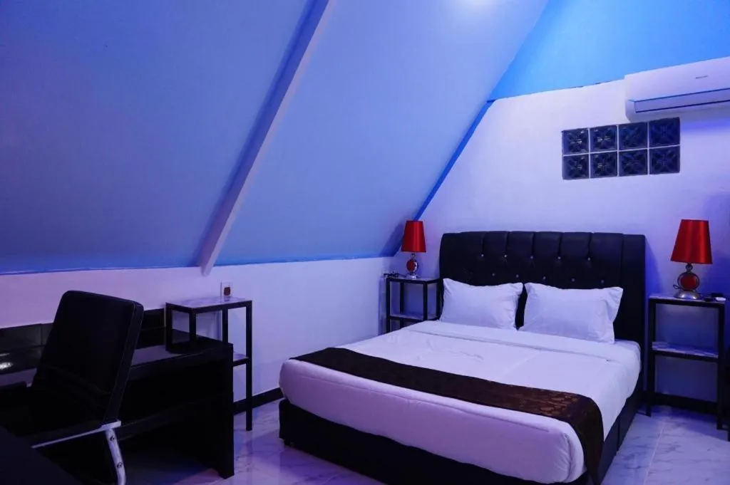 Bed in Sunset Curly Bay Hotel & Resort