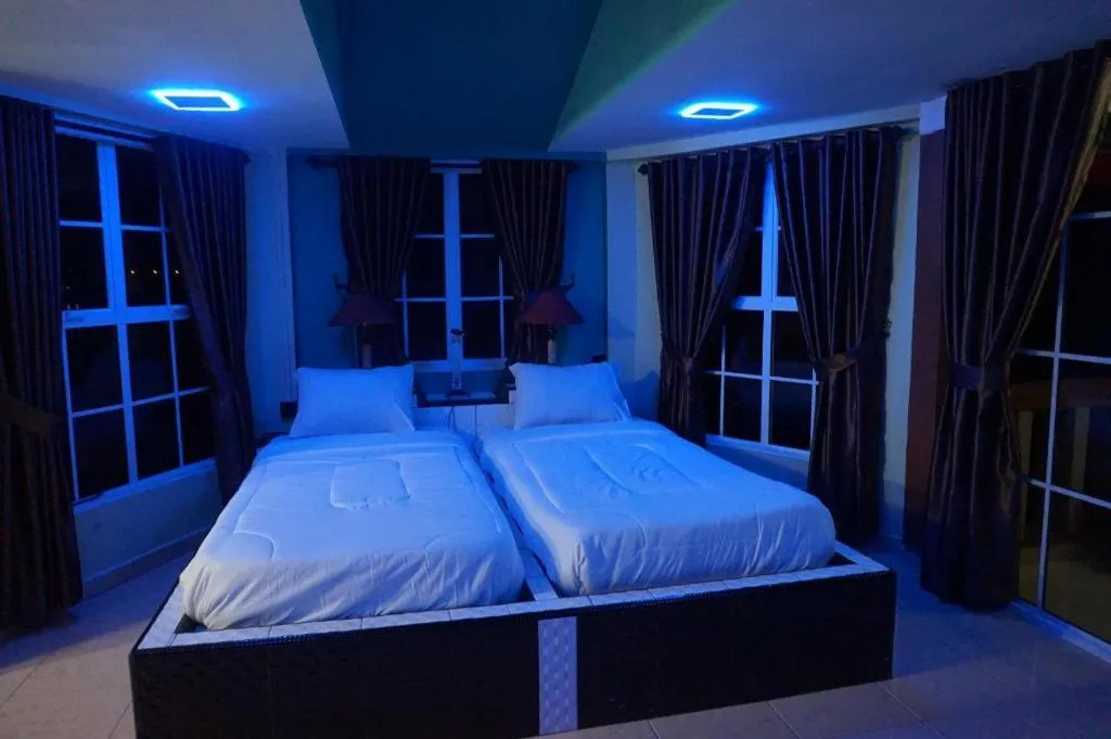 Bed in Sunset Curly Bay Hotel & Resort