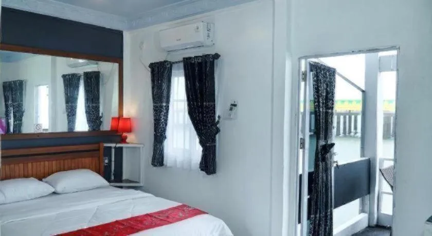 Bed in Sunset Curly Bay Hotel & Resort