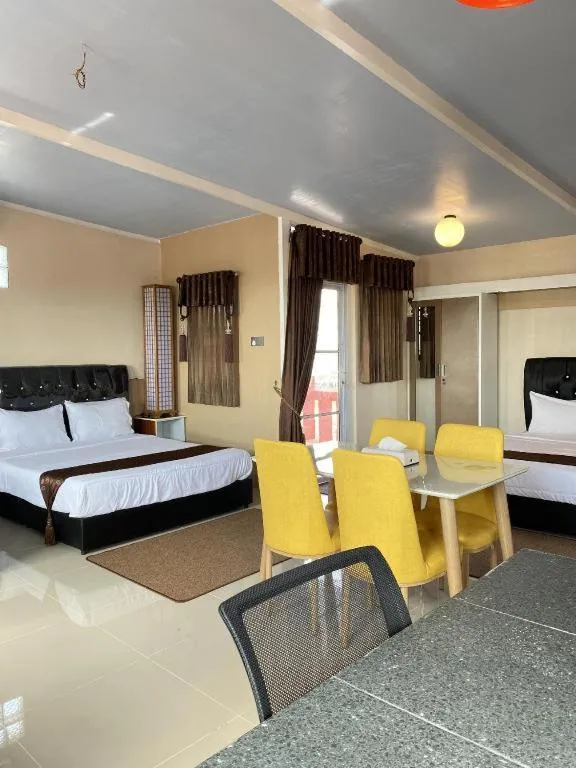 Bed in Sunset Curly Bay Hotel & Resort