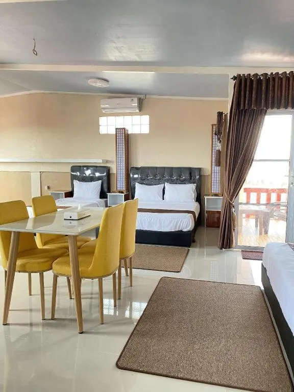 Bed in Sunset Curly Bay Hotel & Resort